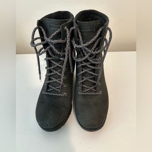 Merrell black wedge lace up boots.